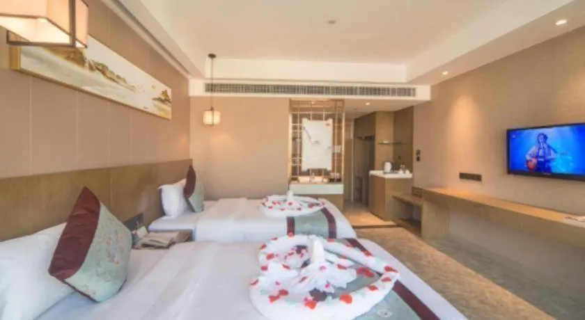 Bed in Xinyuan Hot Spring Hotel