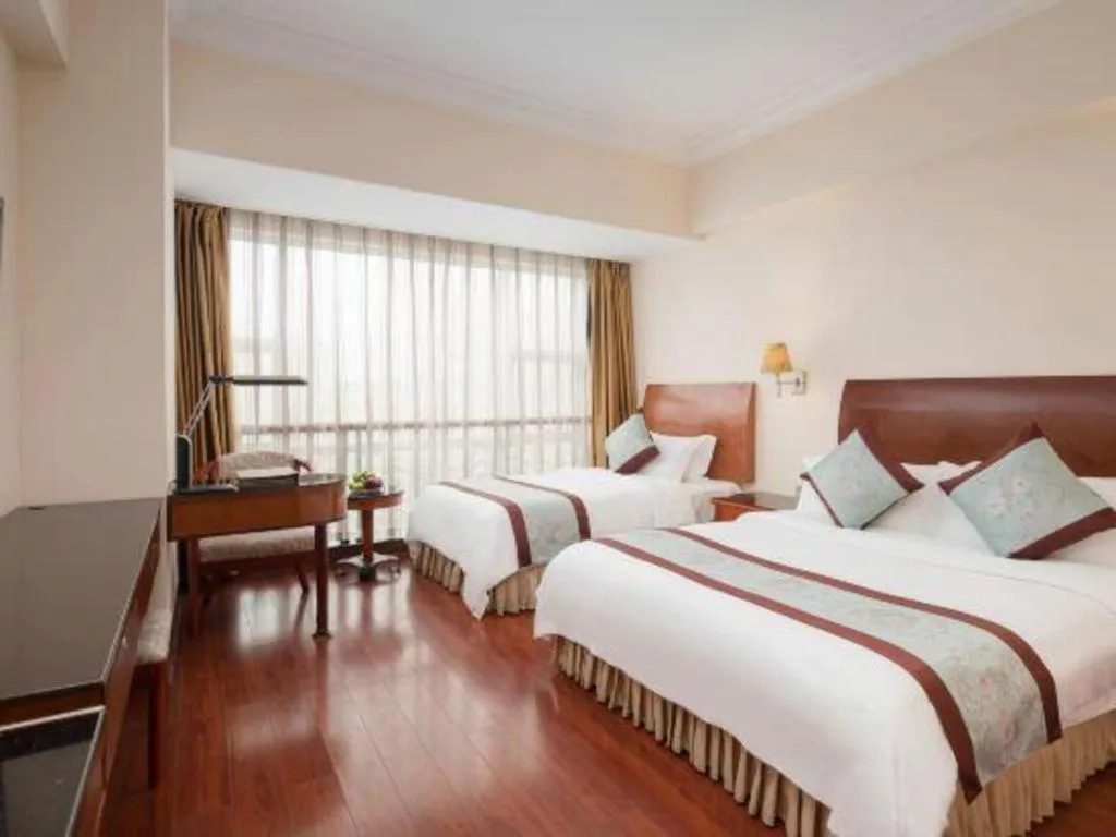 Bed in Xinyuan Hot Spring Hotel