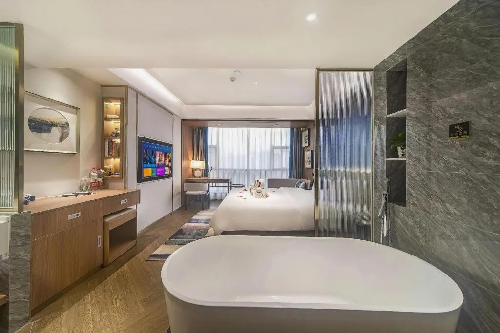 Bed in Xinyuan Hot Spring Hotel