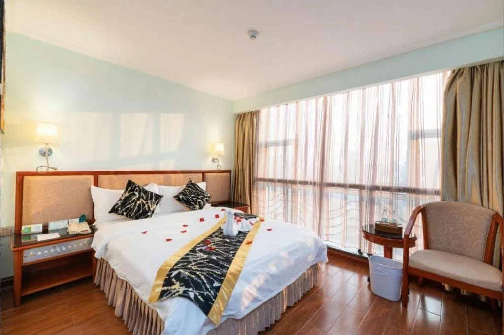 Bed in Xinyuan Hot Spring Hotel