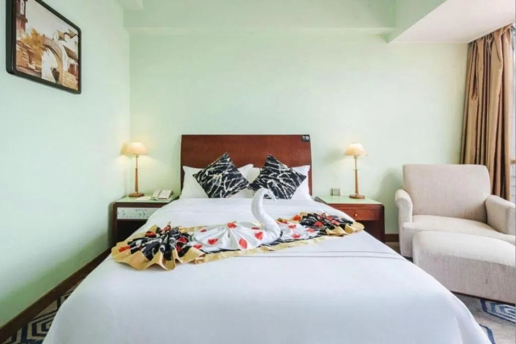 Bed in Xinyuan Hot Spring Hotel