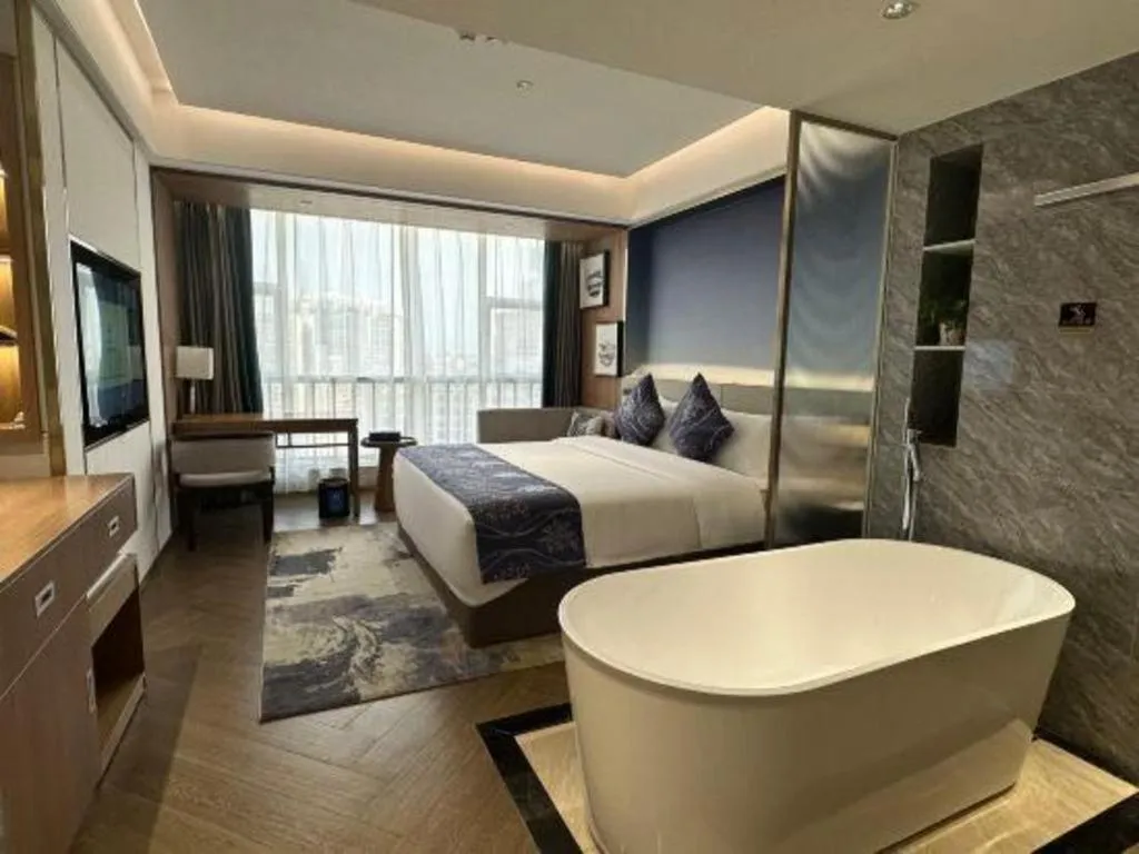 Bed in Xinyuan Hot Spring Hotel