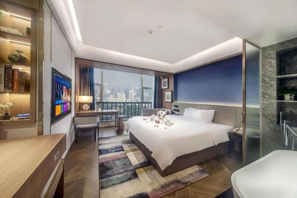 Bed in Xinyuan Hot Spring Hotel