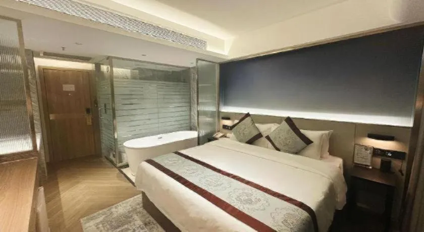 Bed in Xinyuan Hot Spring Hotel
