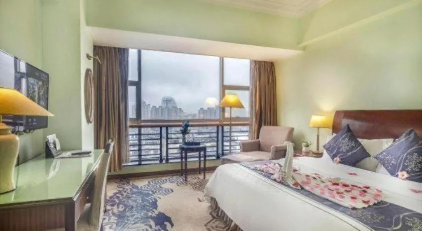 Bed in Xinyuan Hot Spring Hotel