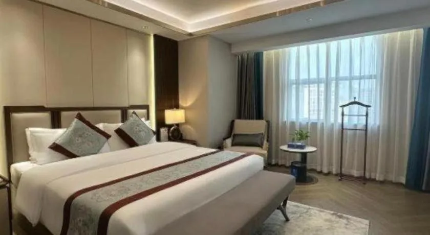 Bed in Xinyuan Hot Spring Hotel