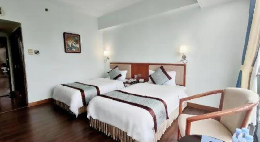 Bed in Xinyuan Hot Spring Hotel