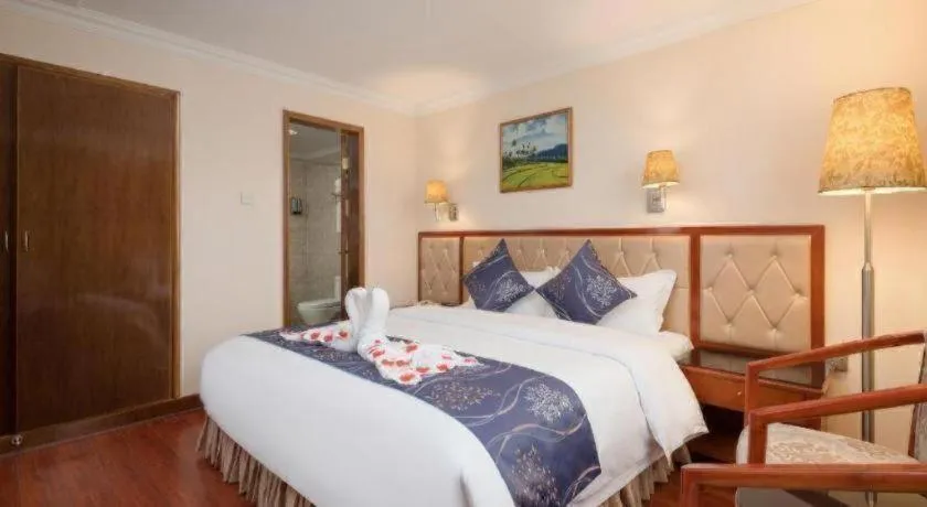 Bed in Xinyuan Hot Spring Hotel