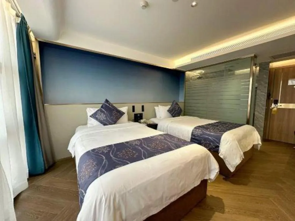 Bed in Xinyuan Hot Spring Hotel