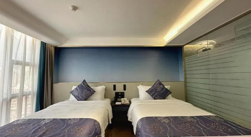 Bed in Xinyuan Hot Spring Hotel