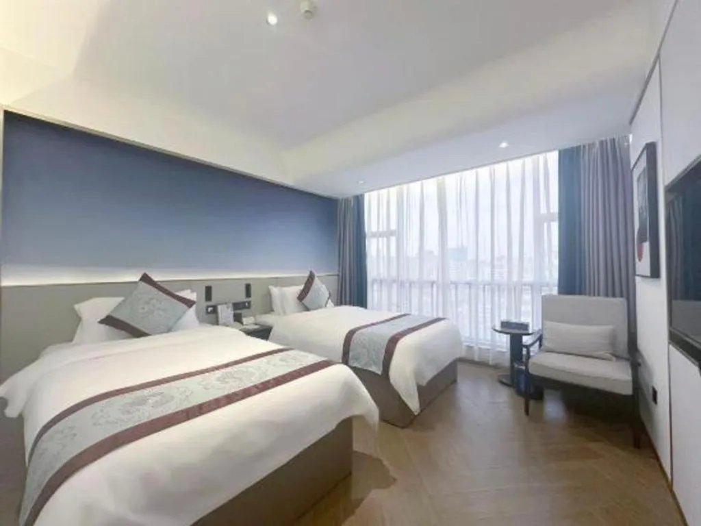 Bed in Xinyuan Hot Spring Hotel