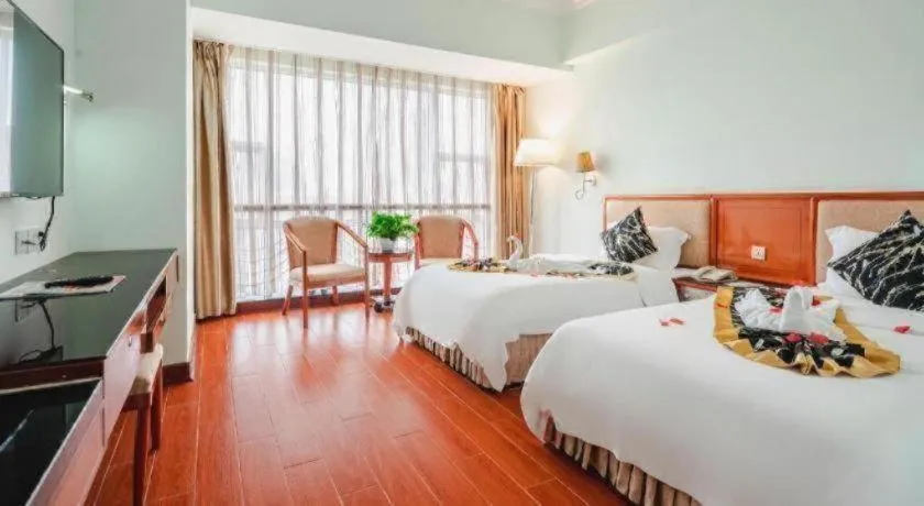 Bed in Xinyuan Hot Spring Hotel