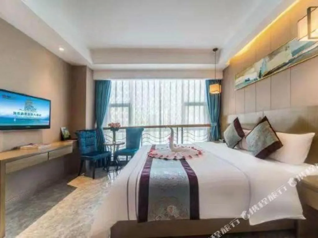Bed in Xinyuan Hot Spring Hotel