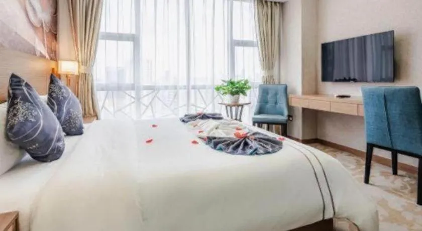 Bed in Xinyuan Hot Spring Hotel