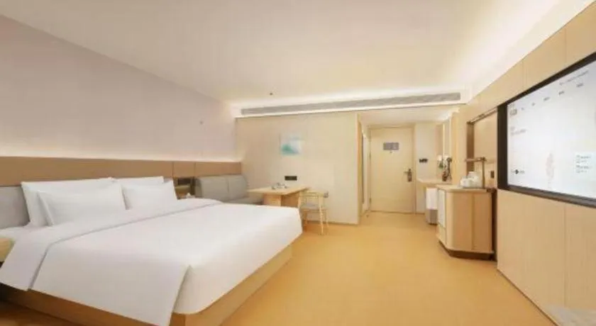 Bed in Dalian Liangyun Hotel