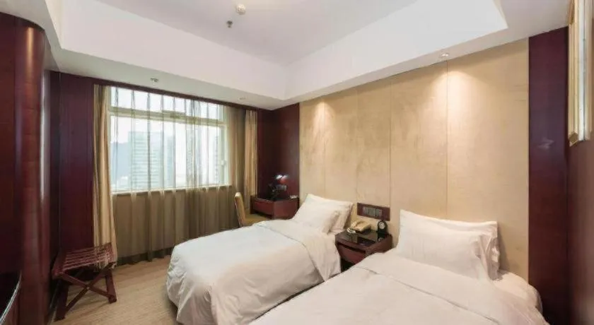 Bed in Dalian Liangyun Hotel