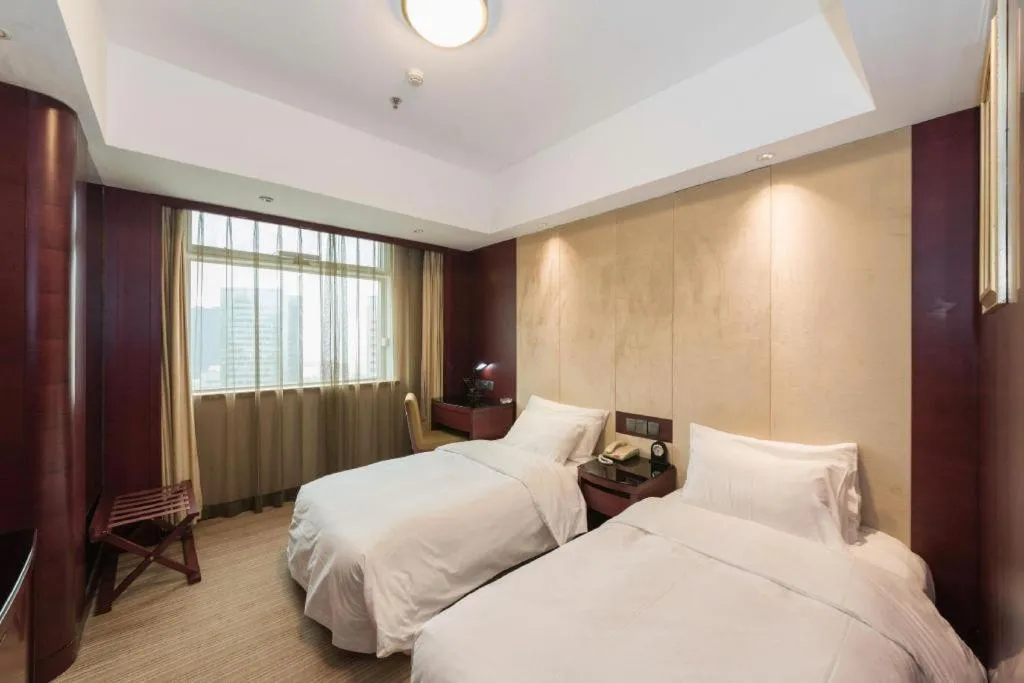 Bed in Dalian Liangyun Hotel