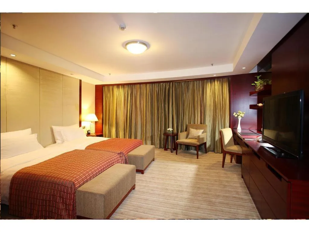 Bed in Dalian Liangyun Hotel