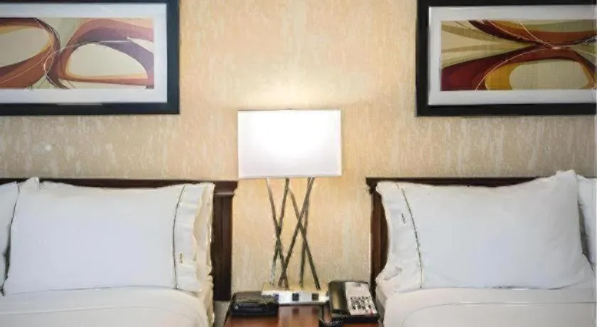 Bed in Holiday Inn Express Hotel And Suites Corinth By IHG