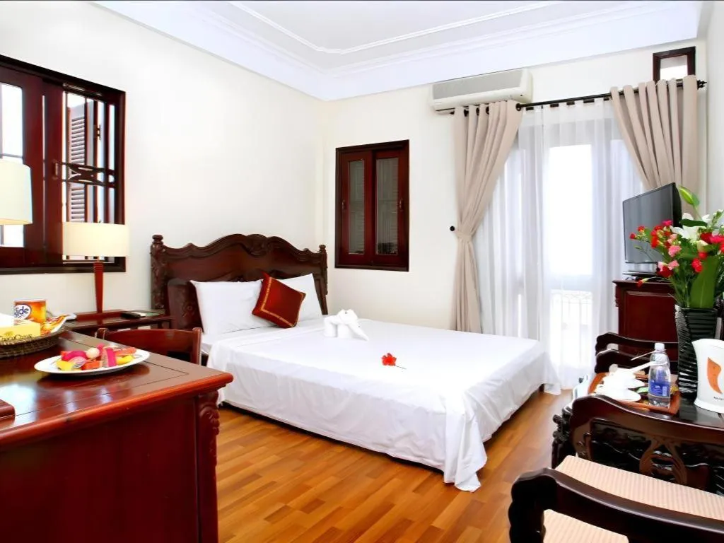 Bed in Hoi An Lantern Hotel