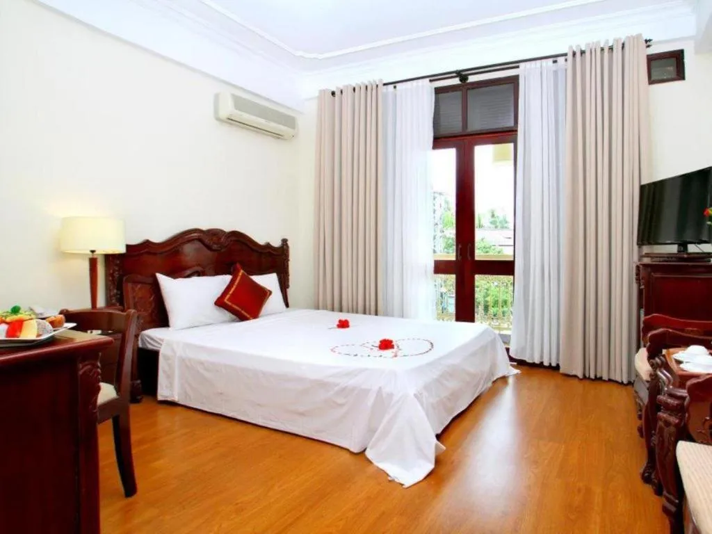 Bed in Hoi An Lantern Hotel