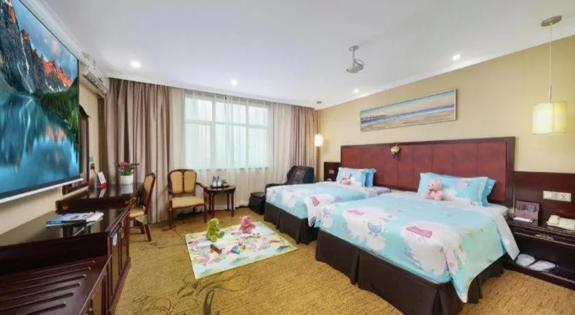 Bed in Sun Island Holiday Hotel