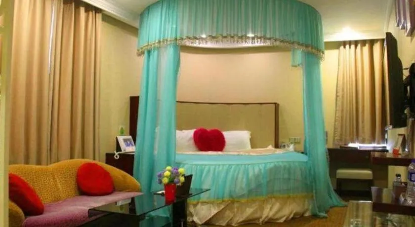 Bed in Sun Island Holiday Hotel