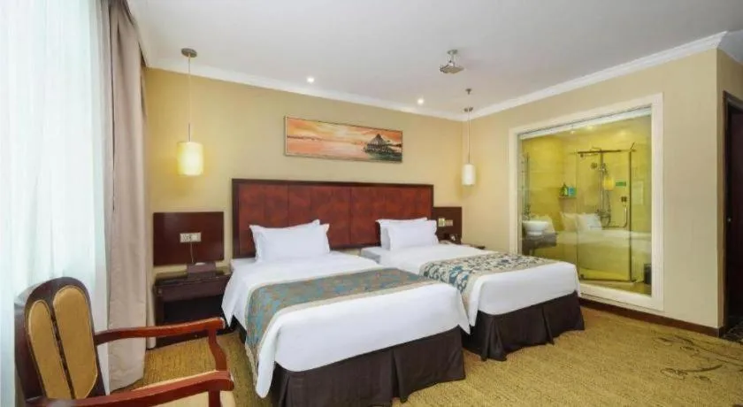 Bed in Sun Island Holiday Hotel