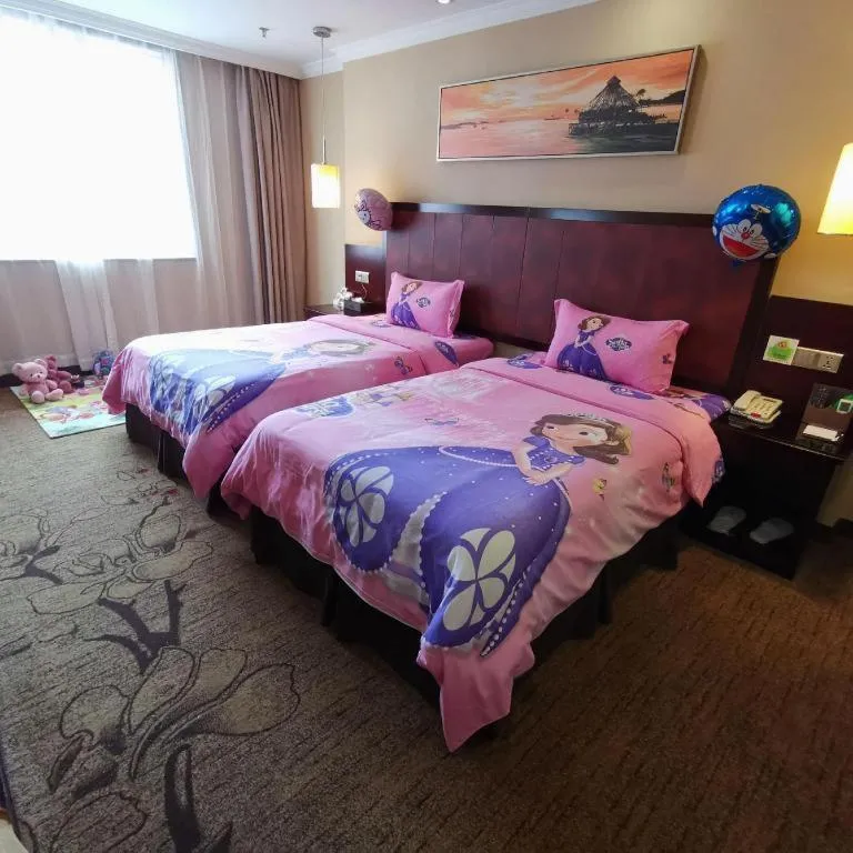 Bed in Sun Island Holiday Hotel