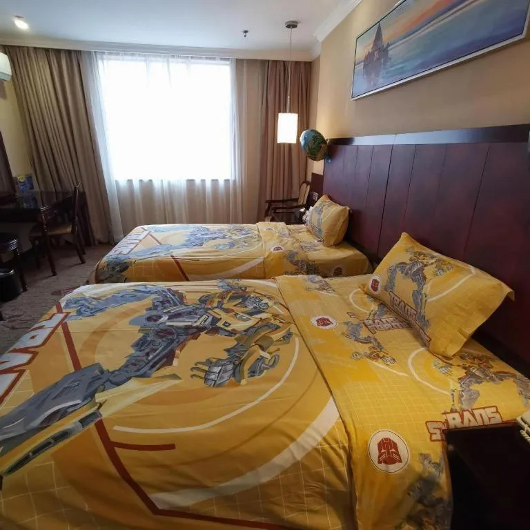 Bed in Sun Island Holiday Hotel