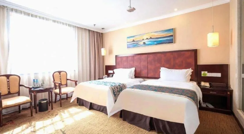 Bed in Sun Island Holiday Hotel