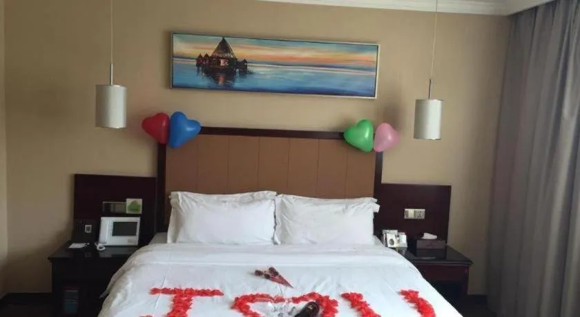 Bed in Sun Island Holiday Hotel