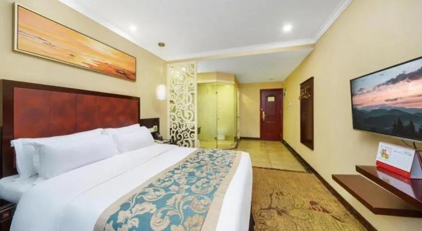 Bed in Sun Island Holiday Hotel