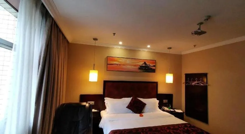 Bed in Sun Island Holiday Hotel