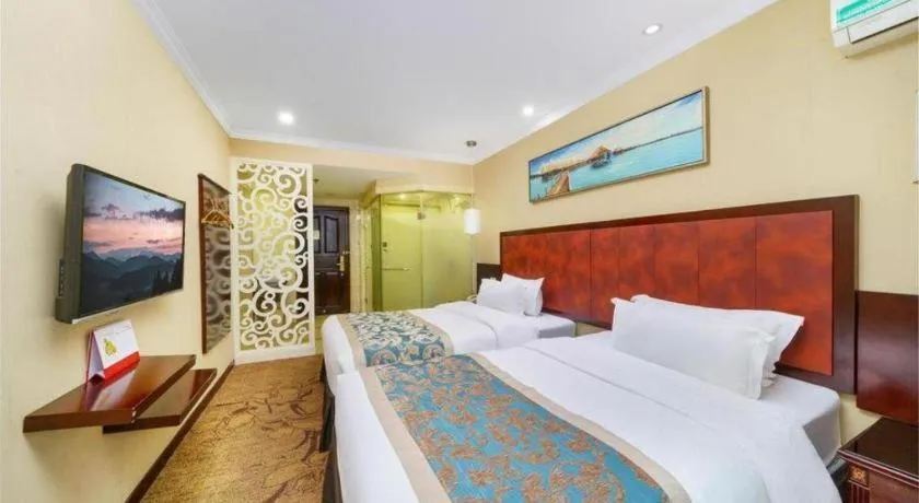 Bed in Sun Island Holiday Hotel