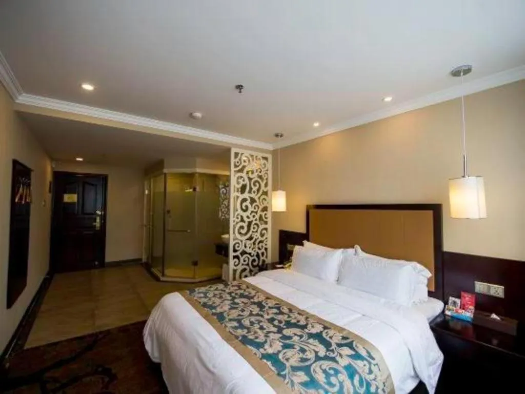 Bed in Sun Island Holiday Hotel