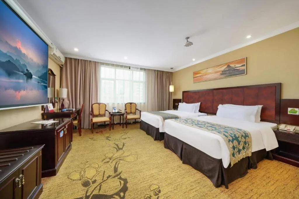 Bed in Sun Island Holiday Hotel