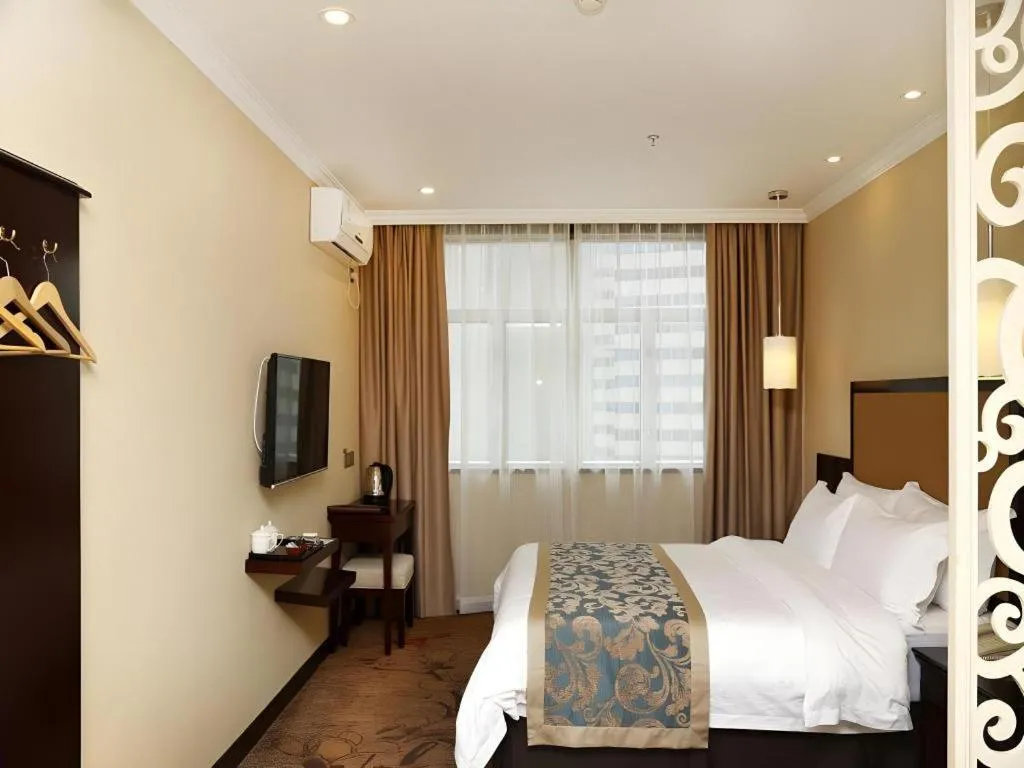 Bed in Sun Island Holiday Hotel