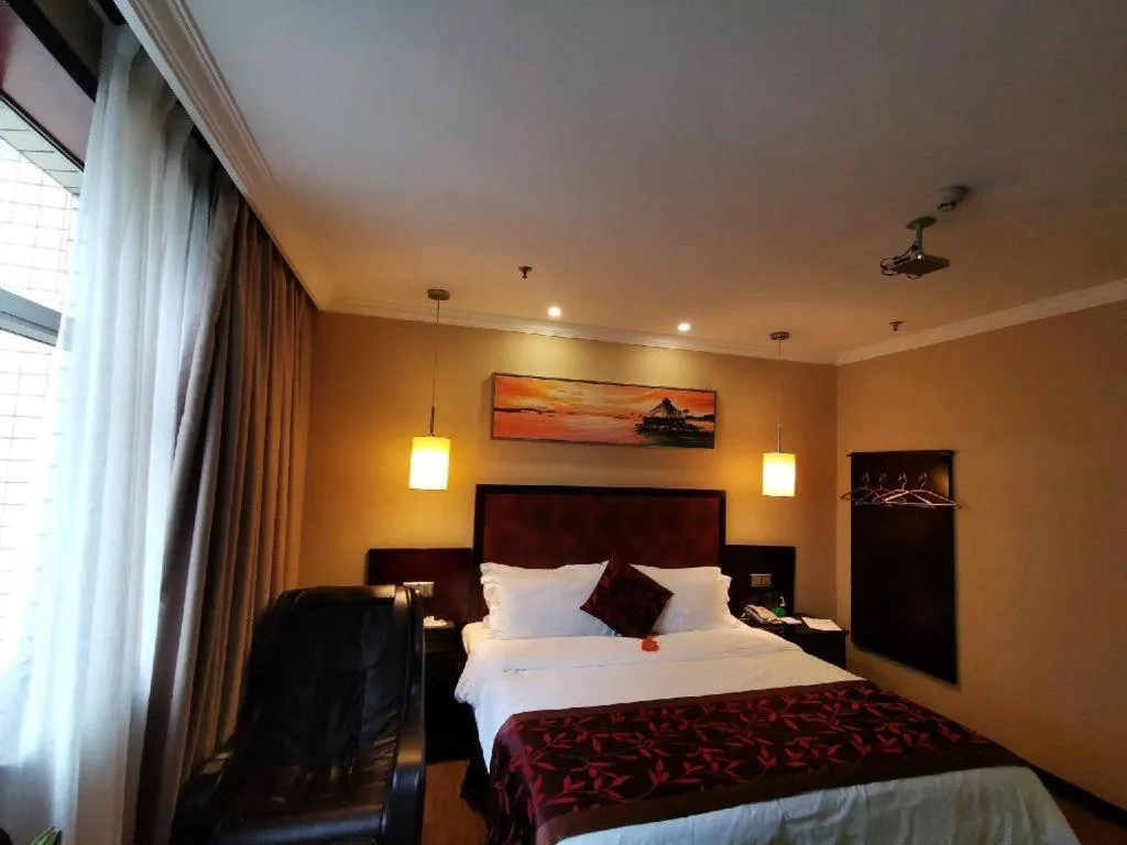 Bed in Sun Island Holiday Hotel