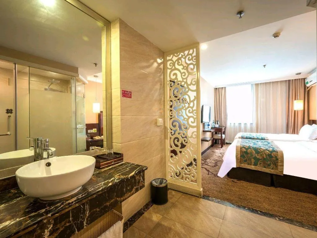 Bed in Sun Island Holiday Hotel