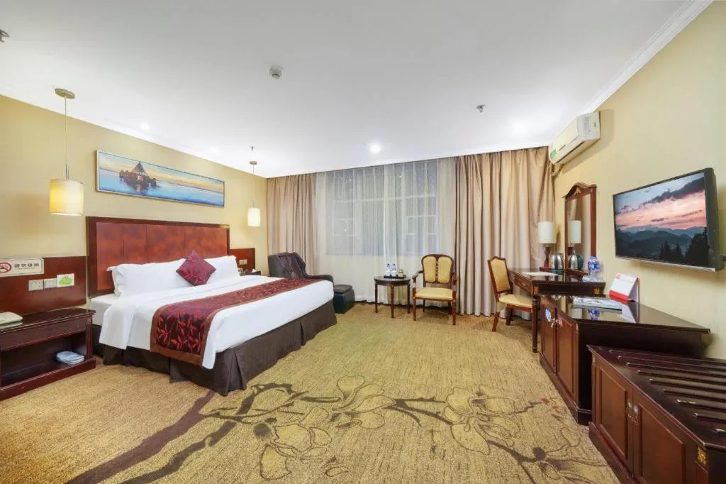 Bed in Sun Island Holiday Hotel