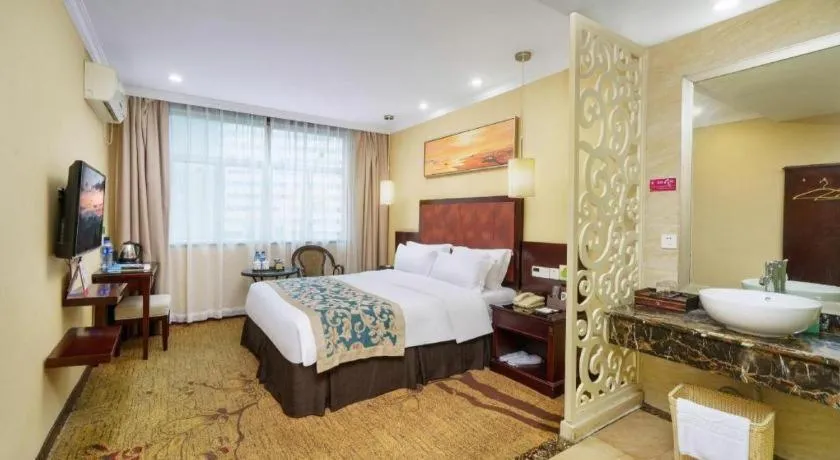 Bed in Sun Island Holiday Hotel