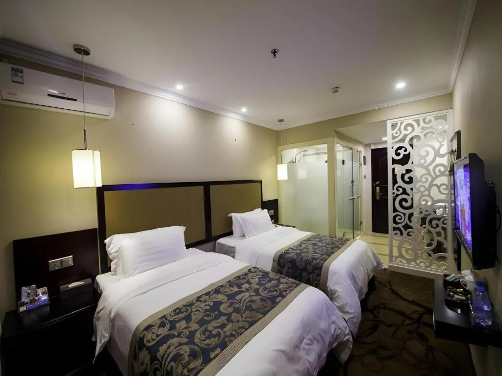 Bed in Sun Island Holiday Hotel