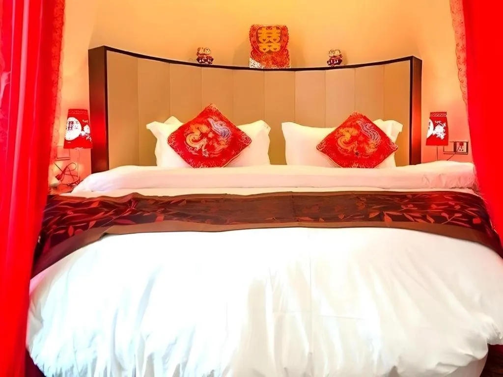 Bed in Sun Island Holiday Hotel