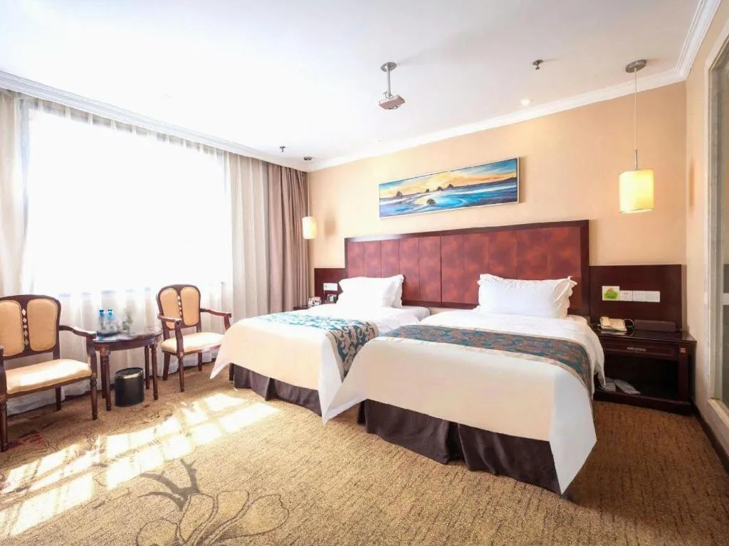 Bed in Sun Island Holiday Hotel