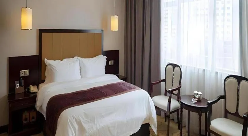 Bed in Sun Island Holiday Hotel