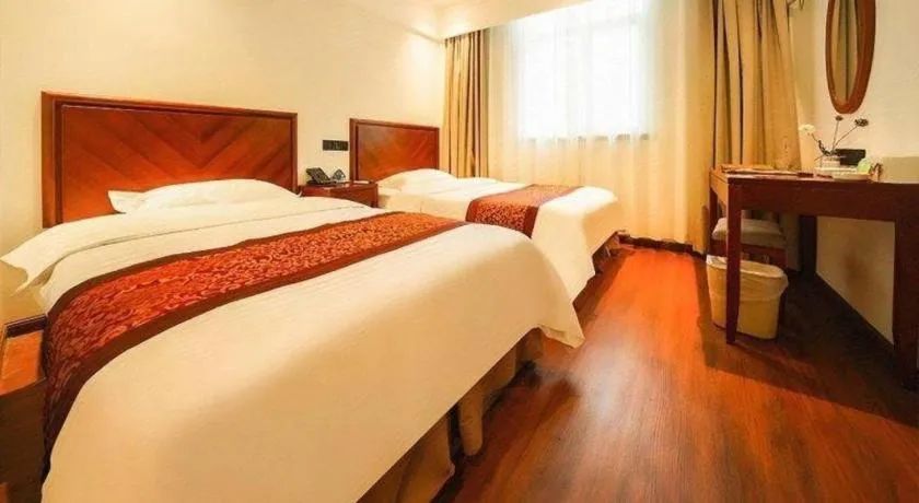 Bed in GreenTree Inn Suzhou Wuzhong