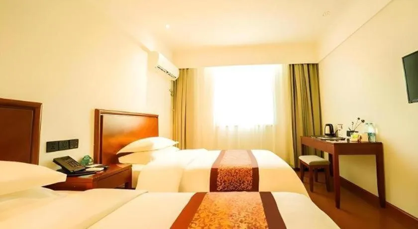 Bed in GreenTree Inn Suzhou Wuzhong