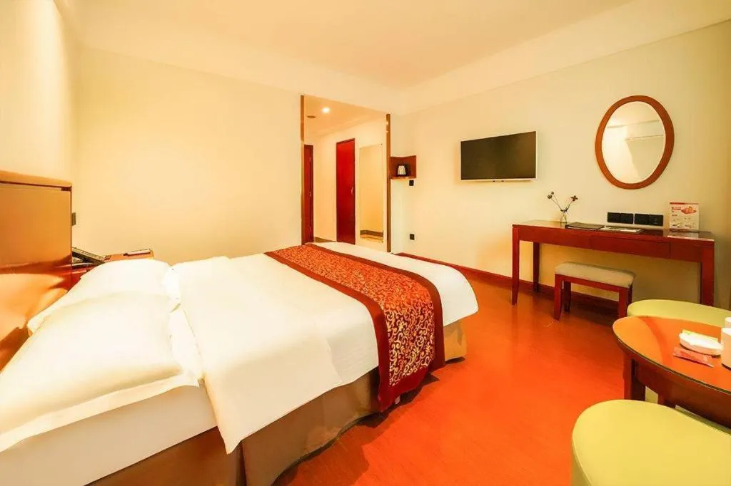 Bed in GreenTree Inn Suzhou Wuzhong