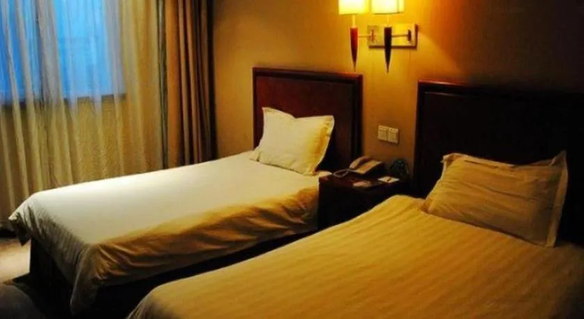 Bed in GreenTree Inn Suzhou Wuzhong